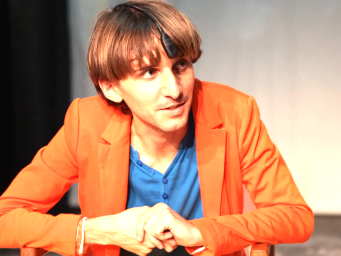 Neil Harbisson had an antenna implanted in his head