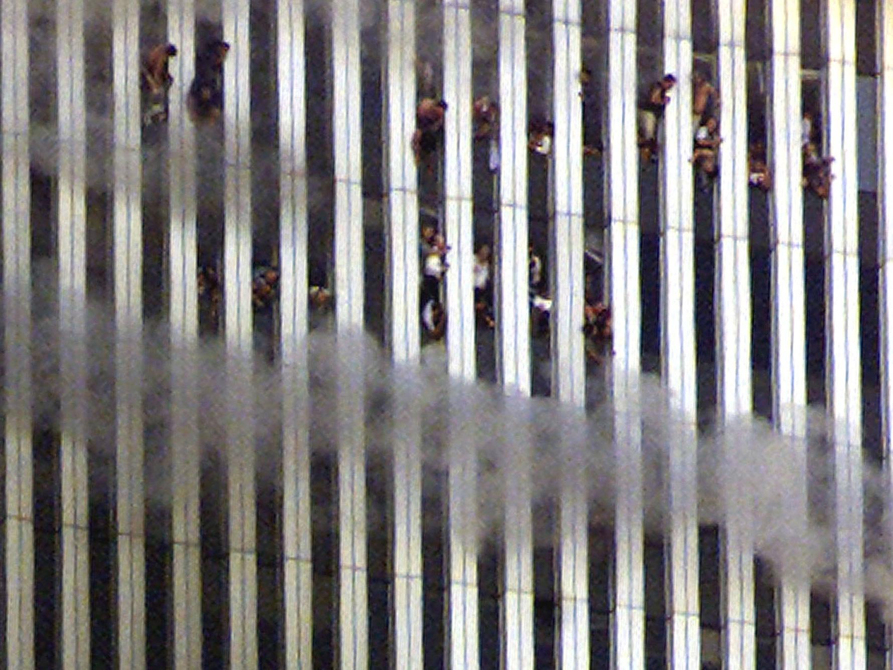 Thousands of people were trapped in upper floors of the towers. Many died when then the planes hit and many more perished as the fires raged and when the towers collapsed. Some jumped to their deaths to escape the conflagration and the smoke. In all, 2,606 people died in the towers.