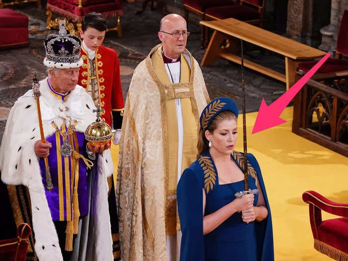 The politician who went viral for carrying swords at King Charles' coronation said she took painkillers before the strenuous task
