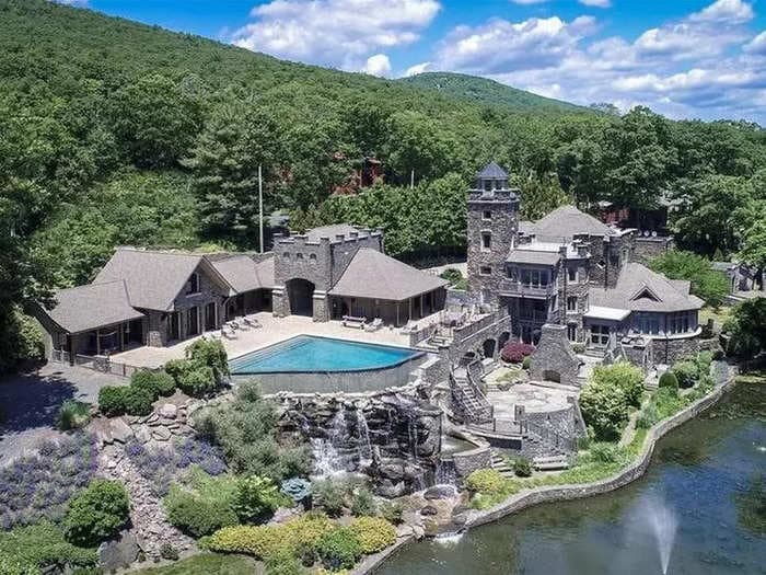 Take a tour of Derek Jeter's unique lake-side castle that has been on the market for 5 years and is headed to auction