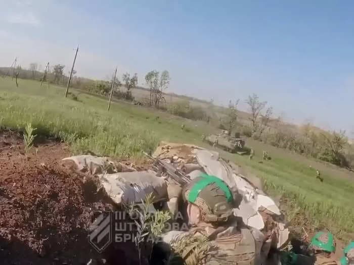 Graphic helmet-cam footage shows an intense battle to capture Russian-occupied territory by a Ukrainian unit