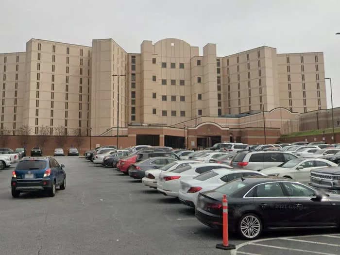 An inmate tunneled through a jail wall and stabbed a man in a neighboring cell, officials say