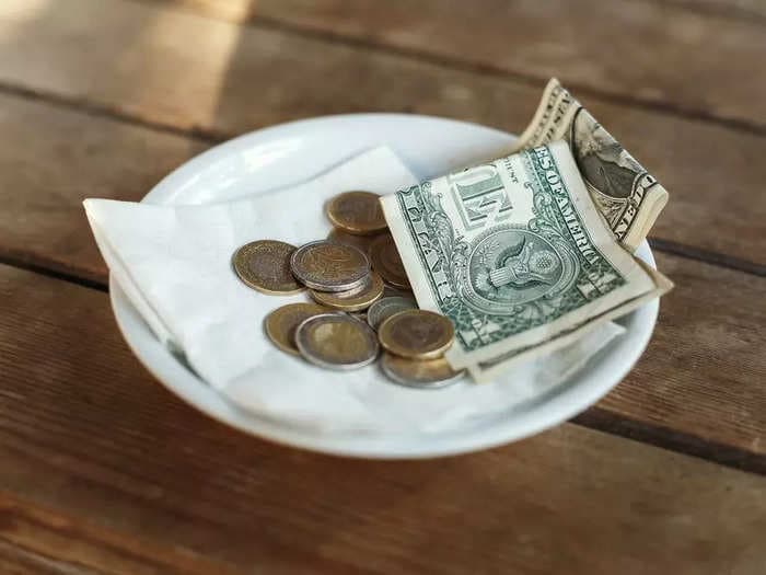 Why does America tip so much? 7 states once tried to ban tipping