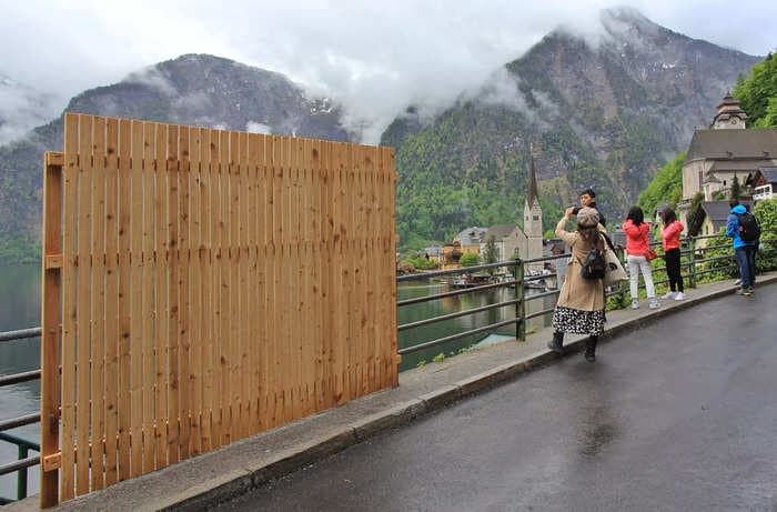 A village that's believed to have inspired the film 'Frozen' has a wall installed to stop tourists flocking there for selfies