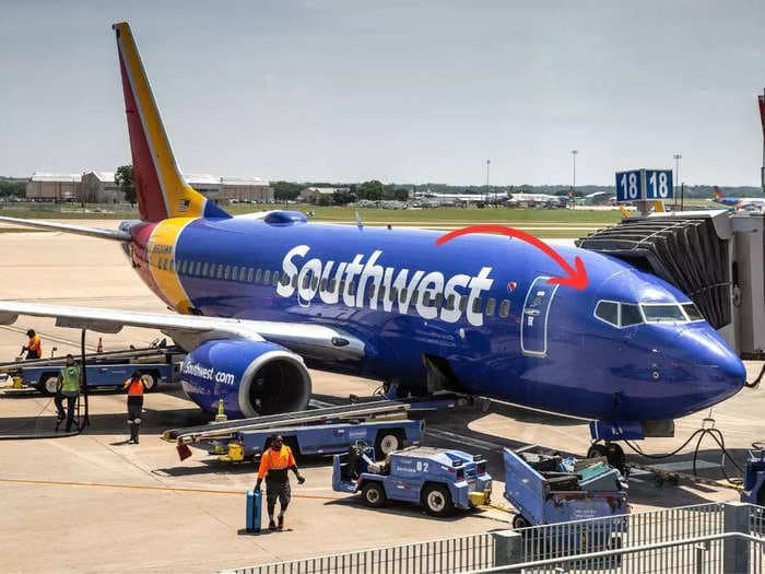 A Southwest pilot crawled in through the plane's window after being locked out of the cockpit before takeoff