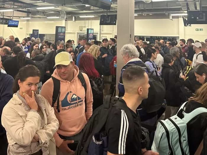 Travel chaos on holiday weekend as passport gates fail at UK airports, causing long delays for passengers