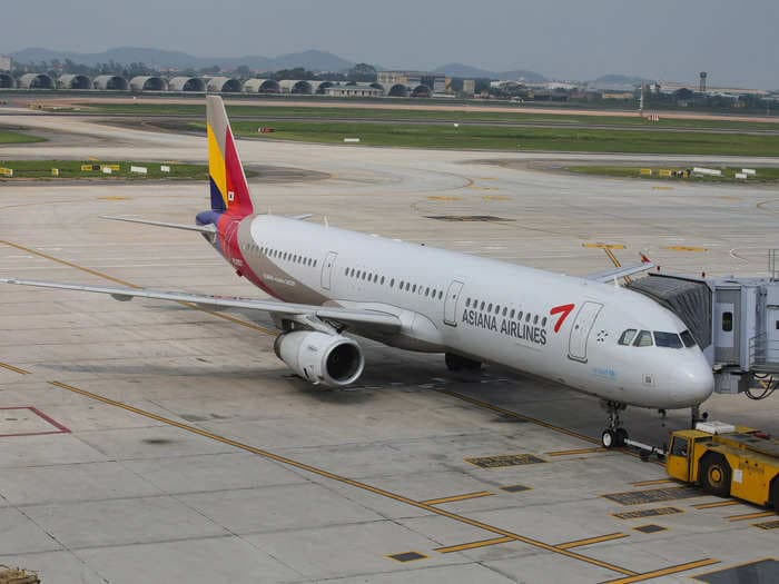 Asiana Airlines will stop selling exit row seats on some of its Airbus A321 jets after a man opened an emergency door during flight