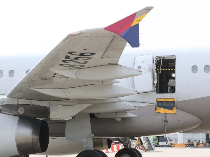 An Asiana Airlines passenger says he thought he was going to die when his flight's emergency door was opened mid-flight