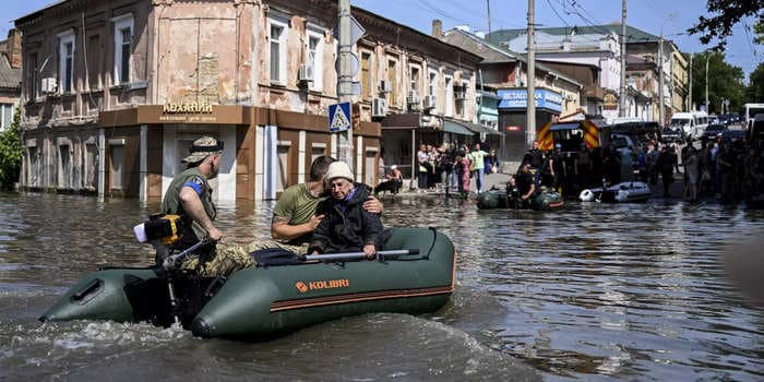 Floods from the dam Russia is accused of destroying also wiped out its own defensive positions, experts say