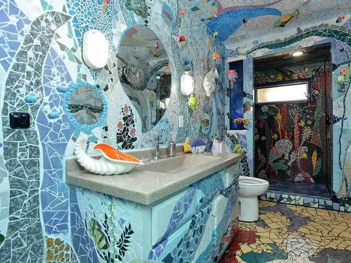 Inspired by his favorite bar, a Missouri man spent 30 years covering his 3-bedroom home in mosaic tiles and funky art. Now, he's putting it on the market for $499,900 &mdash; see inside.