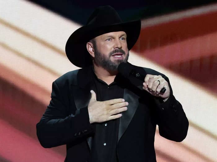 Garth Brooks encouraged patrons of his new bar to 'come in with tolerance' and 'an open mind' after facing boycotts for saying he'll serve Bud Light