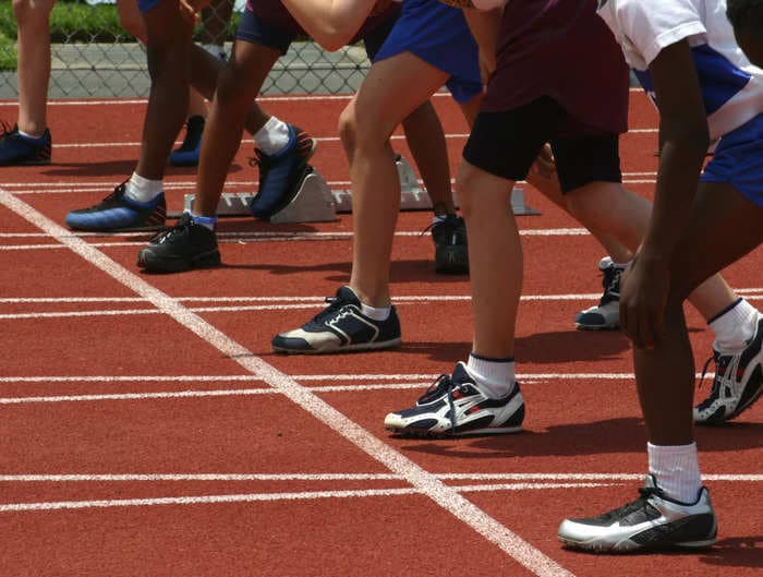 A 9-year-old girl at a school track and field event was left 'shaking and sobbing' after a man accused her of being trans and demanded her disqualification, mom says