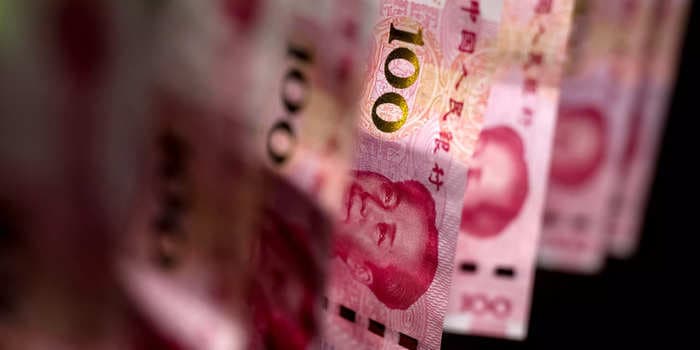 China's yuan has fallen to the lowest rate since 2014 by one measure, and Beijing is OK with that for now, FX strategist says