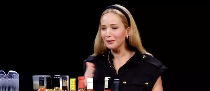 Jennifer Lawrence says she wasn't sure 'Hot Ones' was 'real' but then she tried the 'hottest, most disgusting hot sauce in the world' and instantly burst into tears: 'I feel like I'm gonna die'