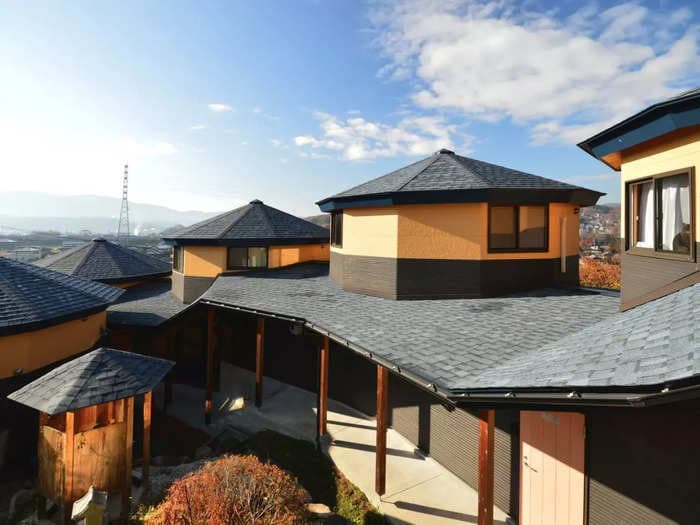 He turned his childhood home in the Japanese countryside into a multipurpose property with 12 round, wooden houses. Now he's trying to sell it for $1.58 million &mdash; check it out.