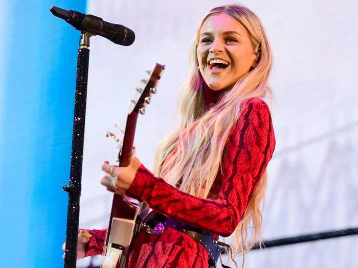 Country star Kelsea Ballerini was hit in the face with an object while performing on stage