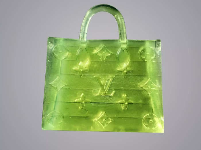 A microscopic, knockoff Louis Vuitton handbag smaller than a grain of salt just sold for $63,750