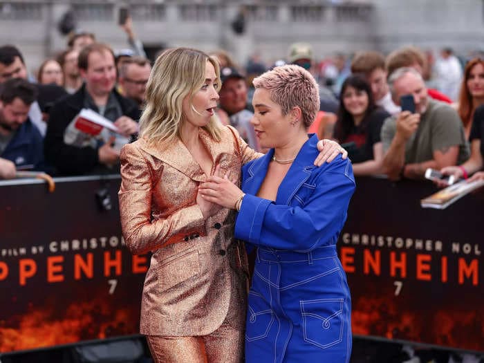 Florence Pugh appeared to save Emily Blunt from a major wardrobe malfunction on the 'Oppenheimer' red carpet
