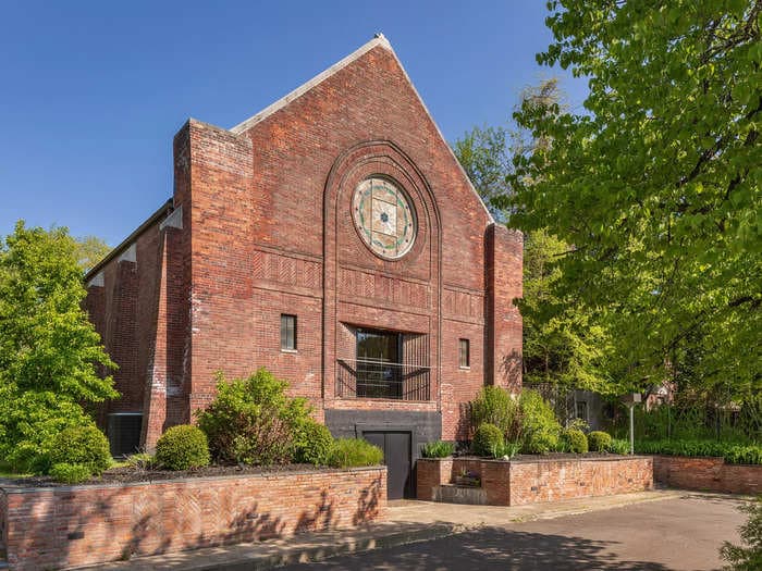 A woman with a soft spot for 'old tatty buildings' turned an abandoned 1930s abbey into a multimillion-dollar property &mdash; check it out