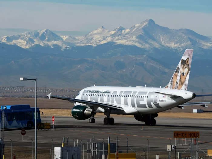 A Frontier Airlines flight was grounded after passengers got into a heated, expletive-filled fight