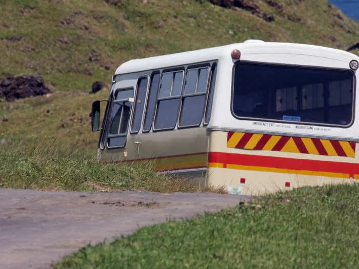 A woman was yelled at by her tour guide when she fell asleep on the bus, sparking discussion about respectful tourist behavior