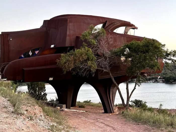 A couple transformed a futuristic steel sculpture into a 3-bedroom, 2,450-square foot Airbnb for $850 a night. See inside the Texas landmark.