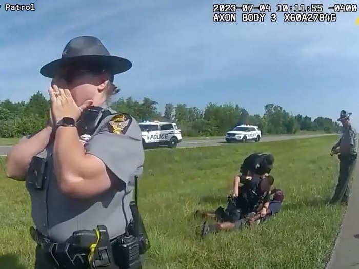 Body cam video shows an Ohio state trooper shouting at police not to let their dog loose on an unarmed Black man. They did it anyway.