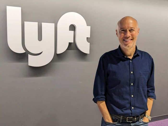 Lyft's new CEO reversed its WFH policy. Now he says employees should want to come back to the office 'for the snacks.'
