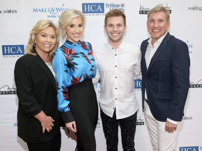 Todd and Julie Chrisley are in 'nightmare' prison conditions, including 'black mold, asbestos,' and snakes 'slithering on the floor,' say their children Savannah and Chase