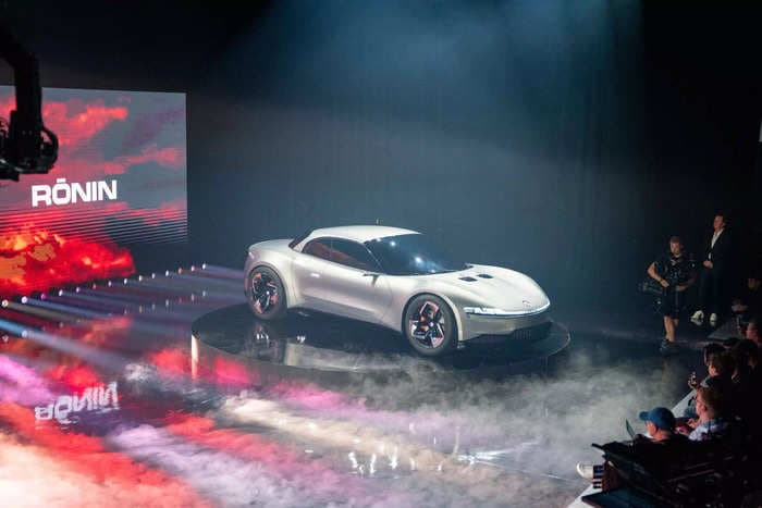 EV startup Fisker revealed plans for a four-door convertible supercar with a Tesla-crushing 600 miles of range