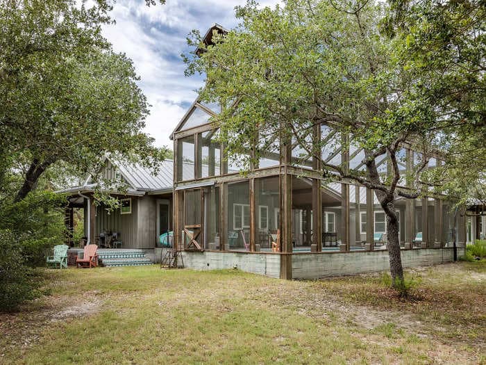 This 2.5-acre Texas homestead with eclectic charm has the ultimate summer accessory: a pool in a barn. See inside the $1.67 million home.