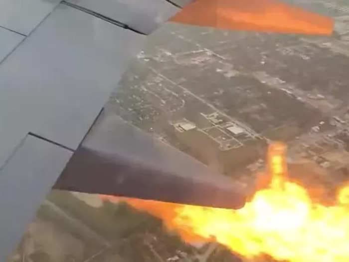 Southwest passenger's video shows plane's engine spitting out flames mid-flight