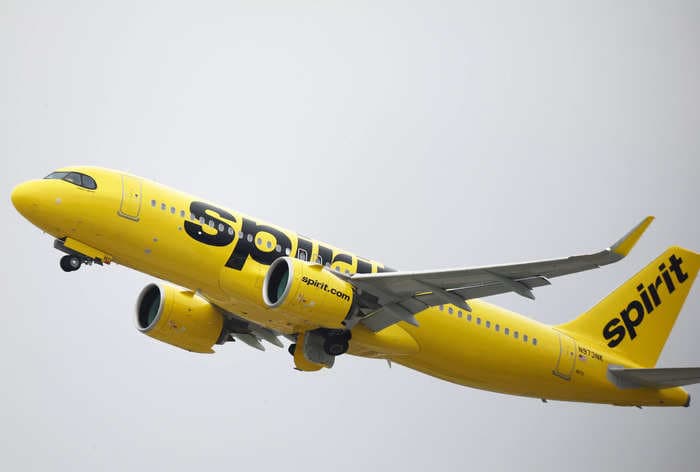 A woman filmed herself and other passengers inside a Spirit Airlines plane she said was stuck on an airport tarmac for 7 hours, and it looks like hell