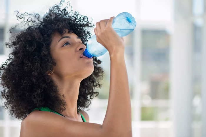 Drinking water could help you lose weight — but not because it's filling you up, a dietitian says