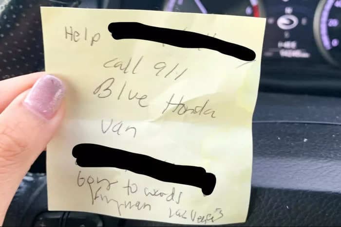 Police rescued a woman from an alleged kidnapper who posed as an Uber driver after she secretly passed a note to a stranger