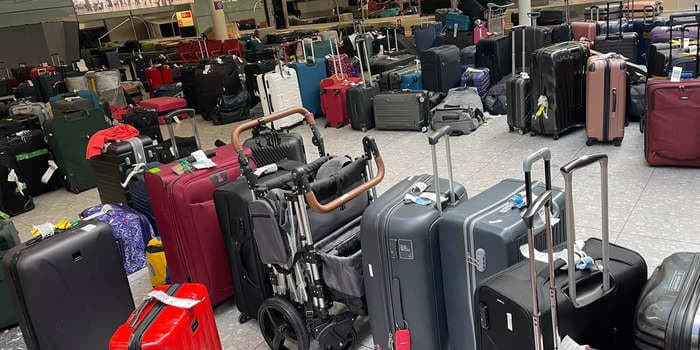 Family with baby twins say they slept in the airport and got only a KitKat and chips to eat after a technical problem nuked UK air travel