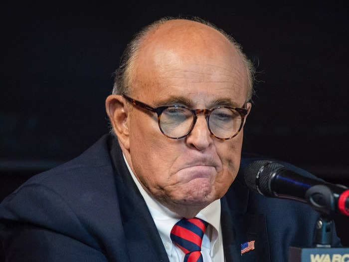 Rudy Giuliani keeps telling judges he's broke, but won't share financial statements and took a private jet to his Georgia booking