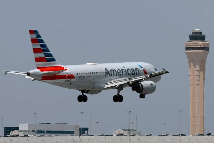 A passenger says she was 'kidnapped' by American Airlines after her flight was diverted to Canada