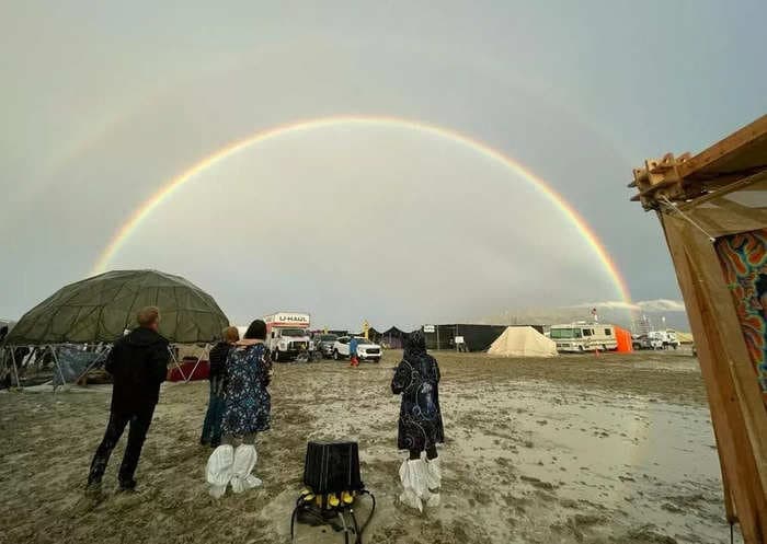 Tech entrepreneur says she ditched her luggage and trekked through ankle-deep mud to escape flooded Burning Man camp: 'It felt like walking in wet scuba gear'      