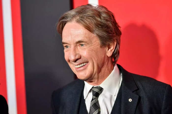 Celebrities including Ben Stiller and fans are defending Martin Short after a critic called him 'desperately unfunny'