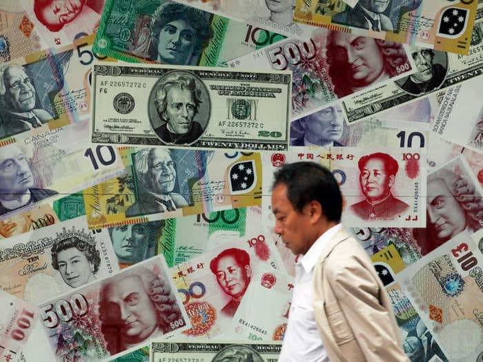 Forget the dollar – China has its hands full propping up the yuan against 23 other currencies, report says