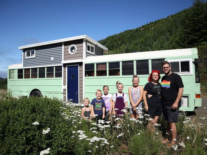 A Texas family who converted a school bus into a house-on-wheels added a tiny home to the roof for their kids. Take a look inside.