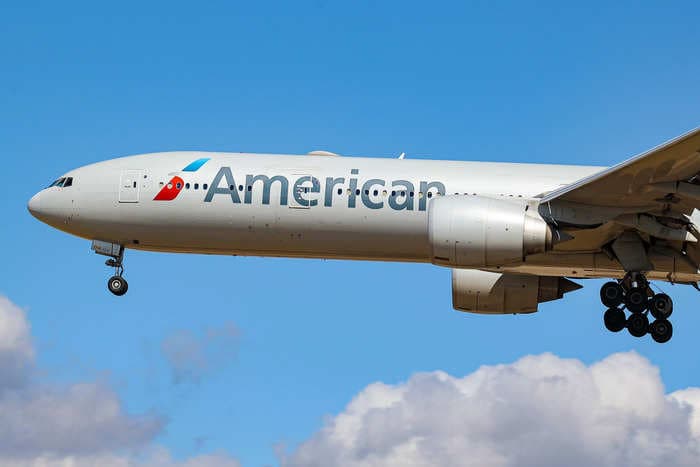 A Black American Airlines passenger says he was met by police at the airport after a flight attendant became suspicious that his multiracial children weren't his