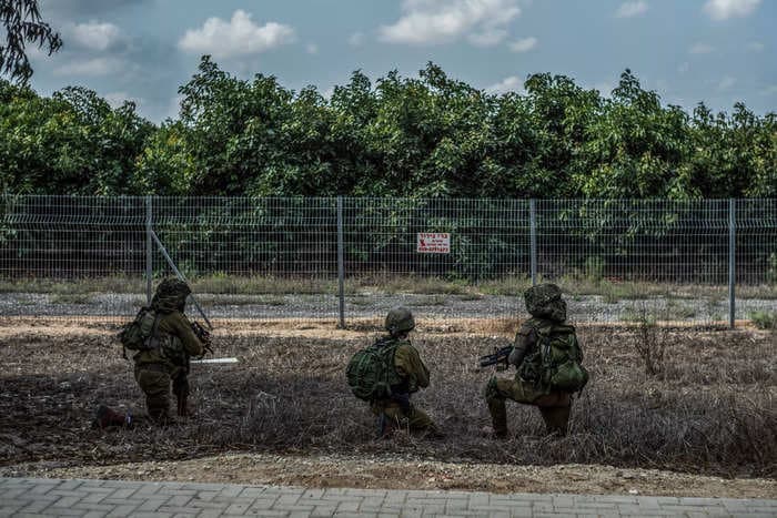 IDF says Hamas fighters killed and decapitated babies at one kibbutz near the Gaza border