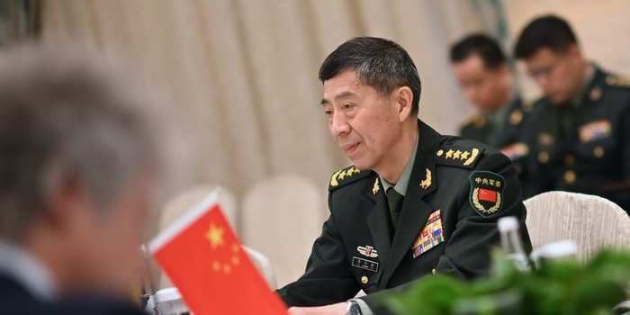 China sacked its defense minister with no explanation months after he mysteriously disappeared