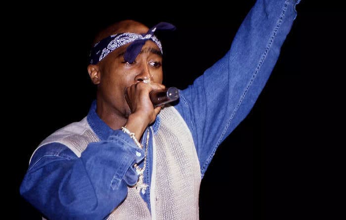 Tupac Shakur's record label received an anonymous call from someone threatening to 'finish him off' after the rapper had been shot, says business partner