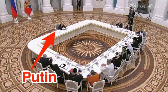 Putin is using a new massive table to keep his distance from officials — and it's just as ridiculous as the original