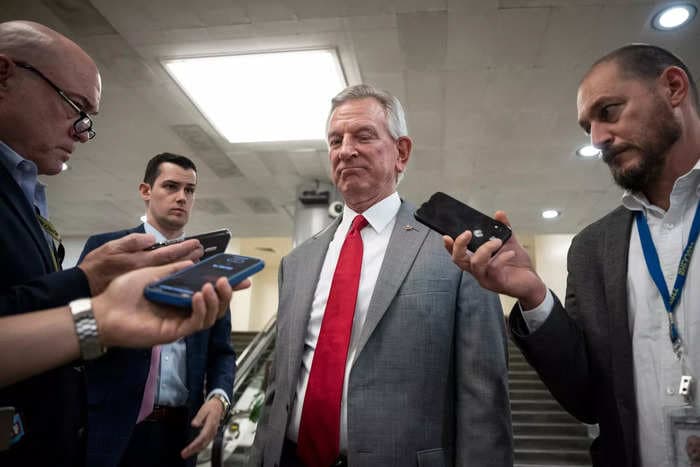 GOP Sen. Tommy Tuberville shrugs off blame for top Marine's heart attack, comparing the general's heavy workload to his time coaching football