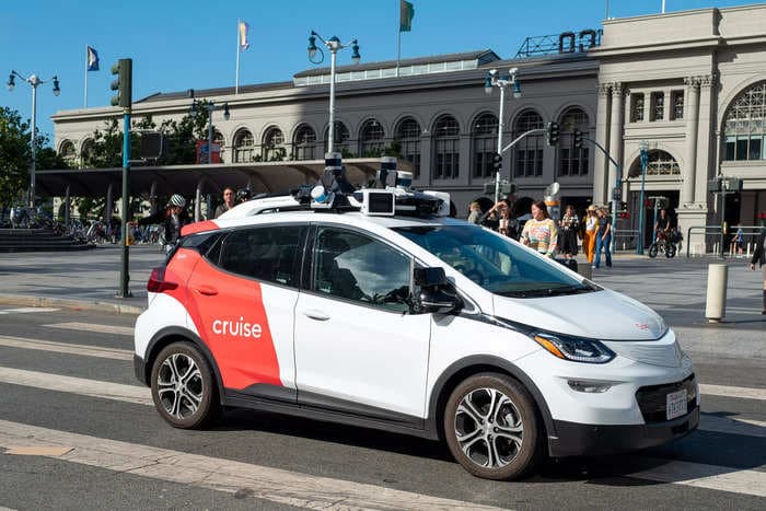 Cruise begins layoffs after suspending its self-driving robotaxis following a collision that dragged pedestrian beneath car