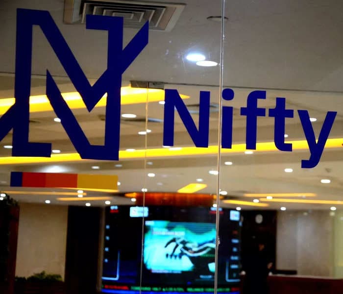 Nifty hits life-time high, Sensex jumps 493 points on favourable macro data